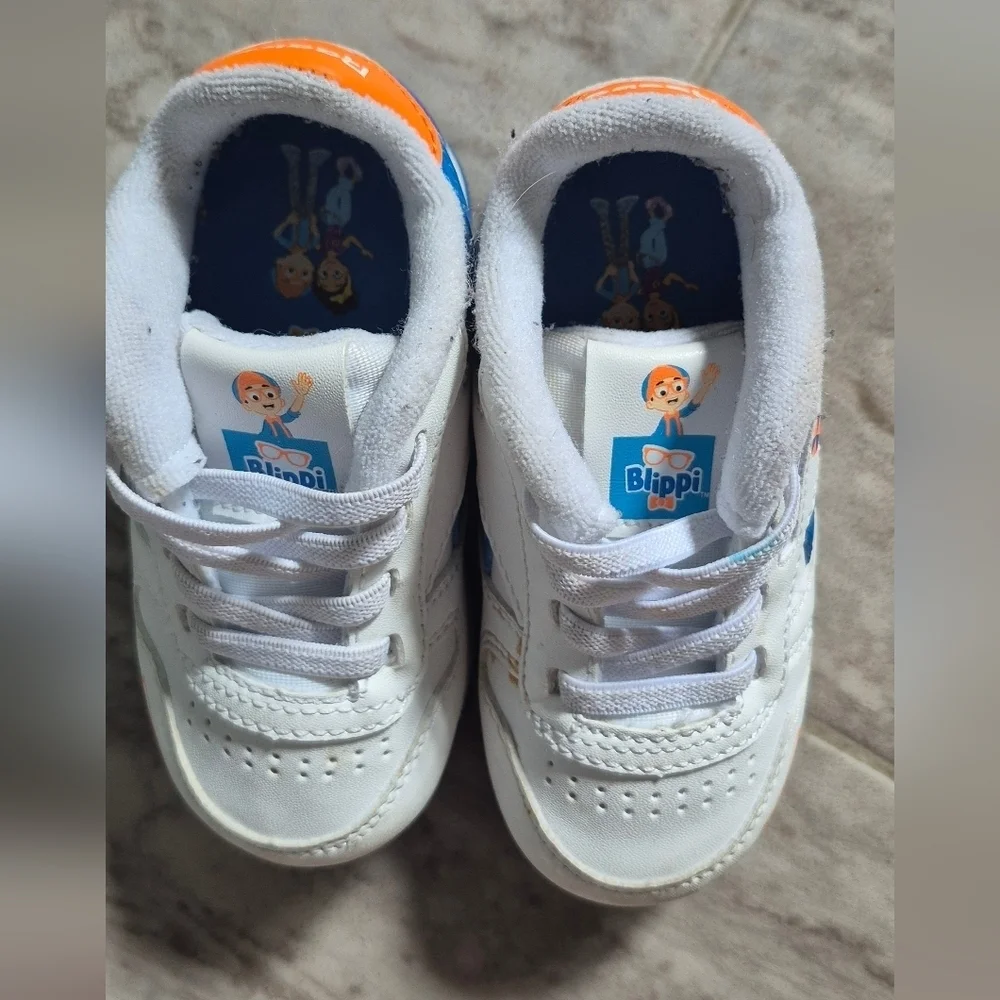 Reebok Kids Sneakers in White and Blue with Orange Accents